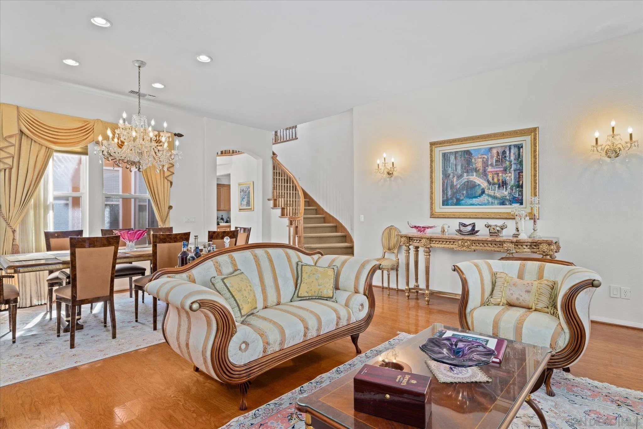 3971 Via Cangrejo San Diego, CA 92130 - Photo 3 of 26 a living room with furniture and a chandelier