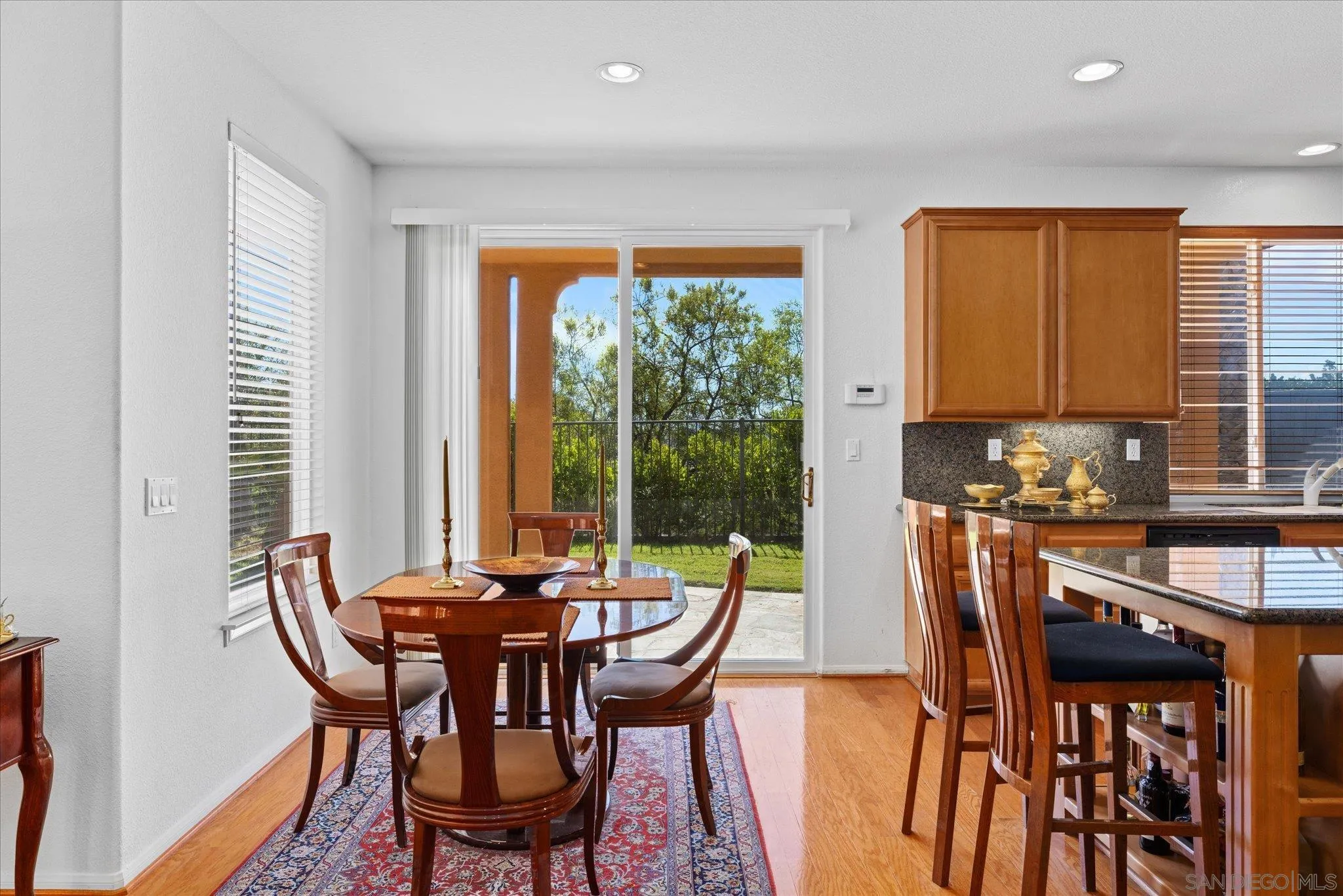 3971 Via Cangrejo San Diego, CA 92130 - Photo 9 of 26 a view of a dining room with furniture and window
