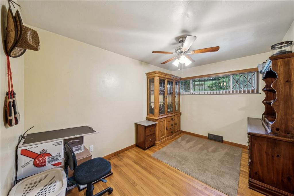 1492 Anderson Road Pittsburgh, PA 15209 - Photo 21 of 46 a bedroom with furniture and a window