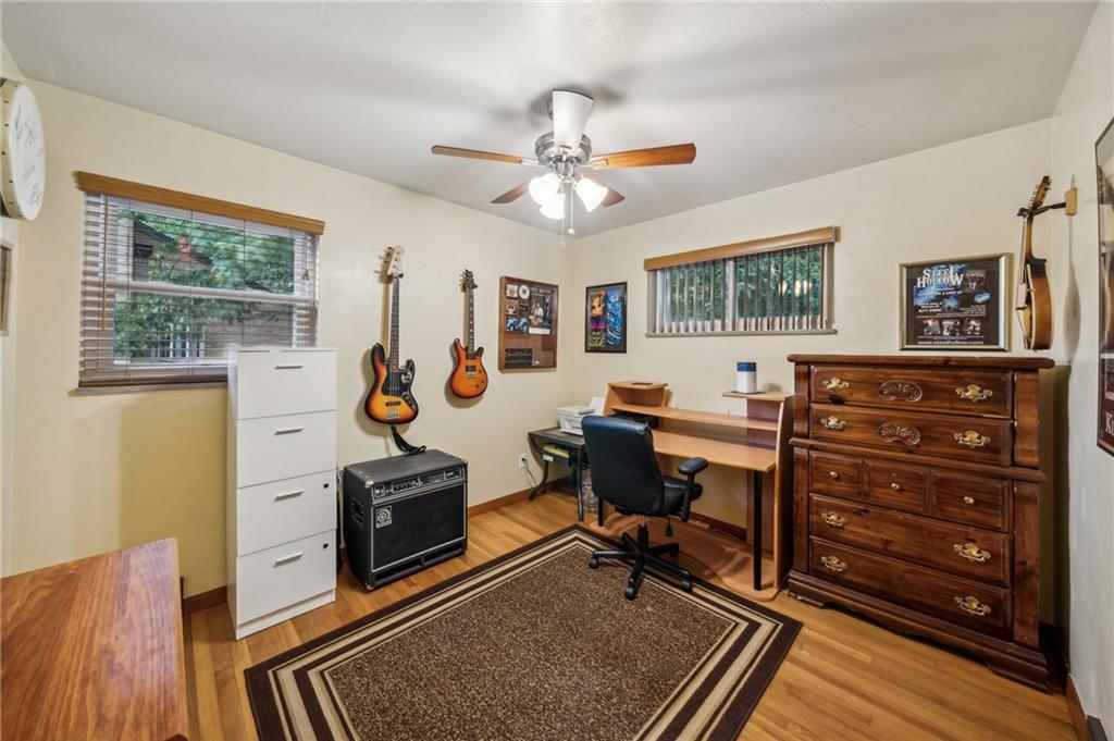 1492 Anderson Road Pittsburgh, PA 15209 - Photo 22 of 46 a view of a workspace with furniture and a window