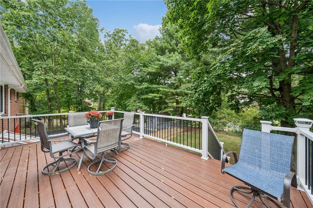 1492 Anderson Road Pittsburgh, PA 15209 - Photo 32 of 46 a view of a chairs and table on the wooden floor