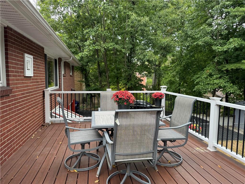 1492 Anderson Road Pittsburgh, PA 15209 - Photo 34 of 46 a roof deck with chairs and wooden floor