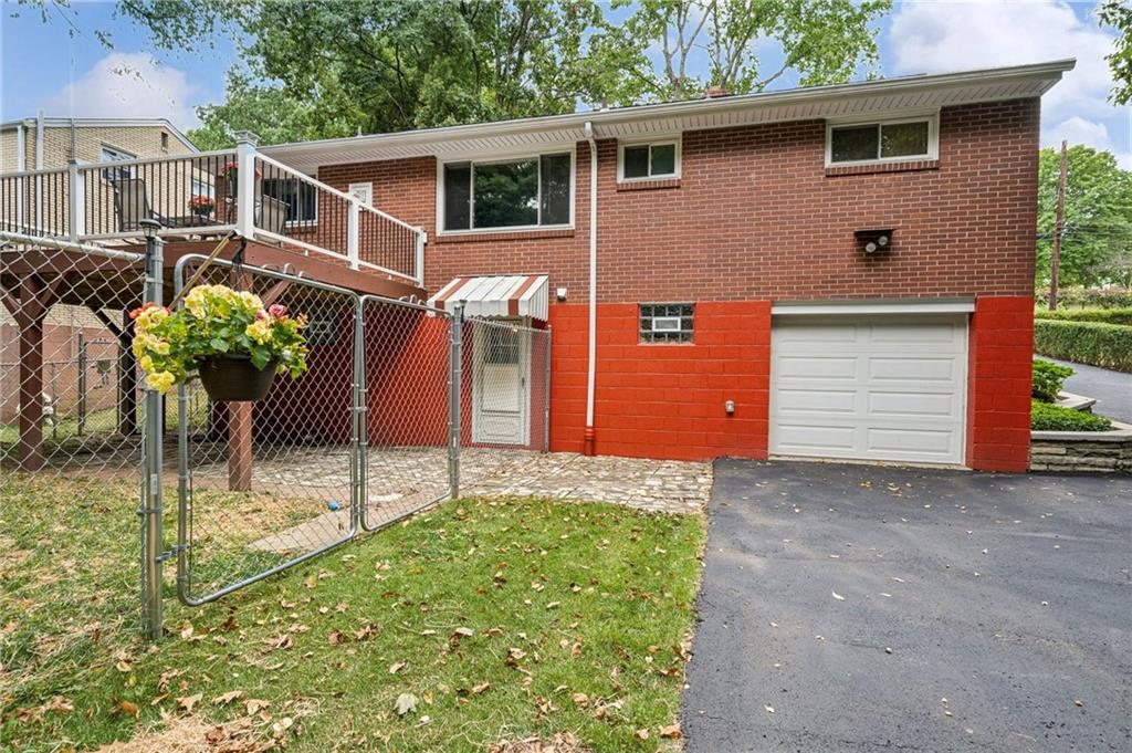 1492 Anderson Road Pittsburgh, PA 15209 - Photo 37 of 46 a front view of a house with garden