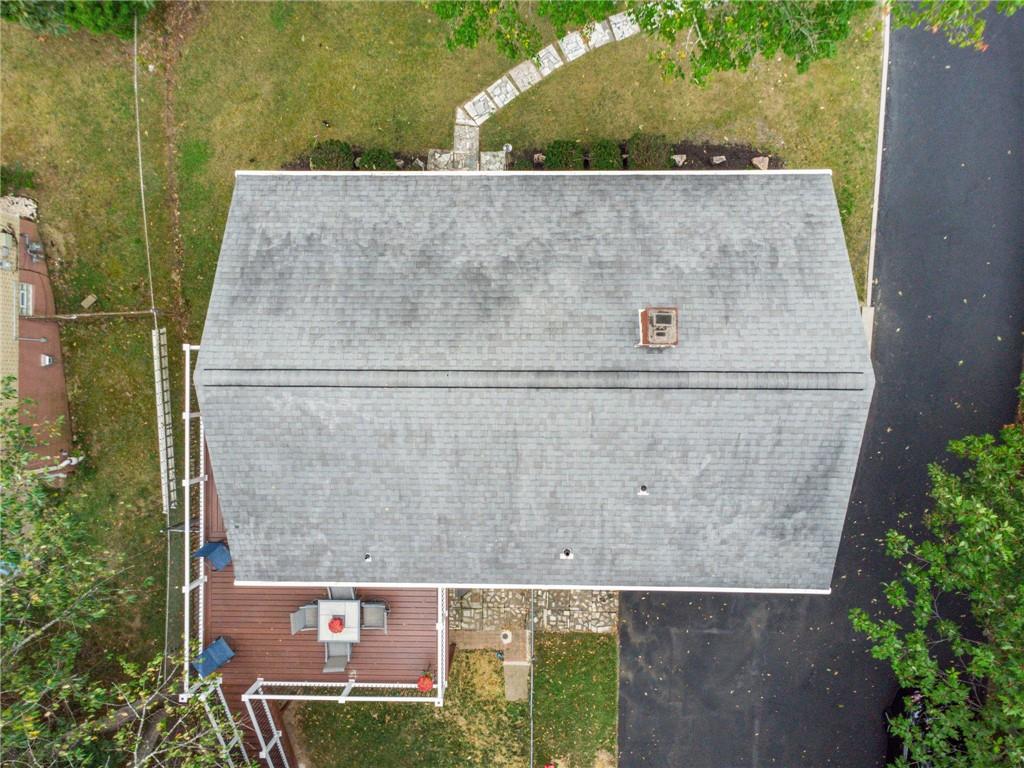 1492 Anderson Road Pittsburgh, PA 15209 - Photo 43 of 46 an aerial view of a house with a yard and a lake view