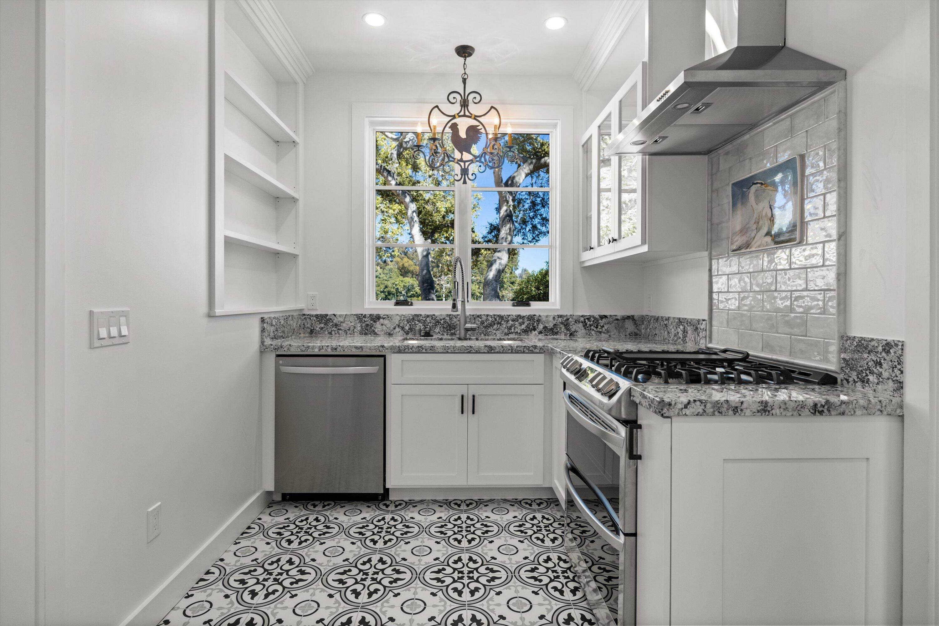 0 East Valley Road Montecito, CA 93108 - Photo 21 of 28 a kitchen with a stove and a sink