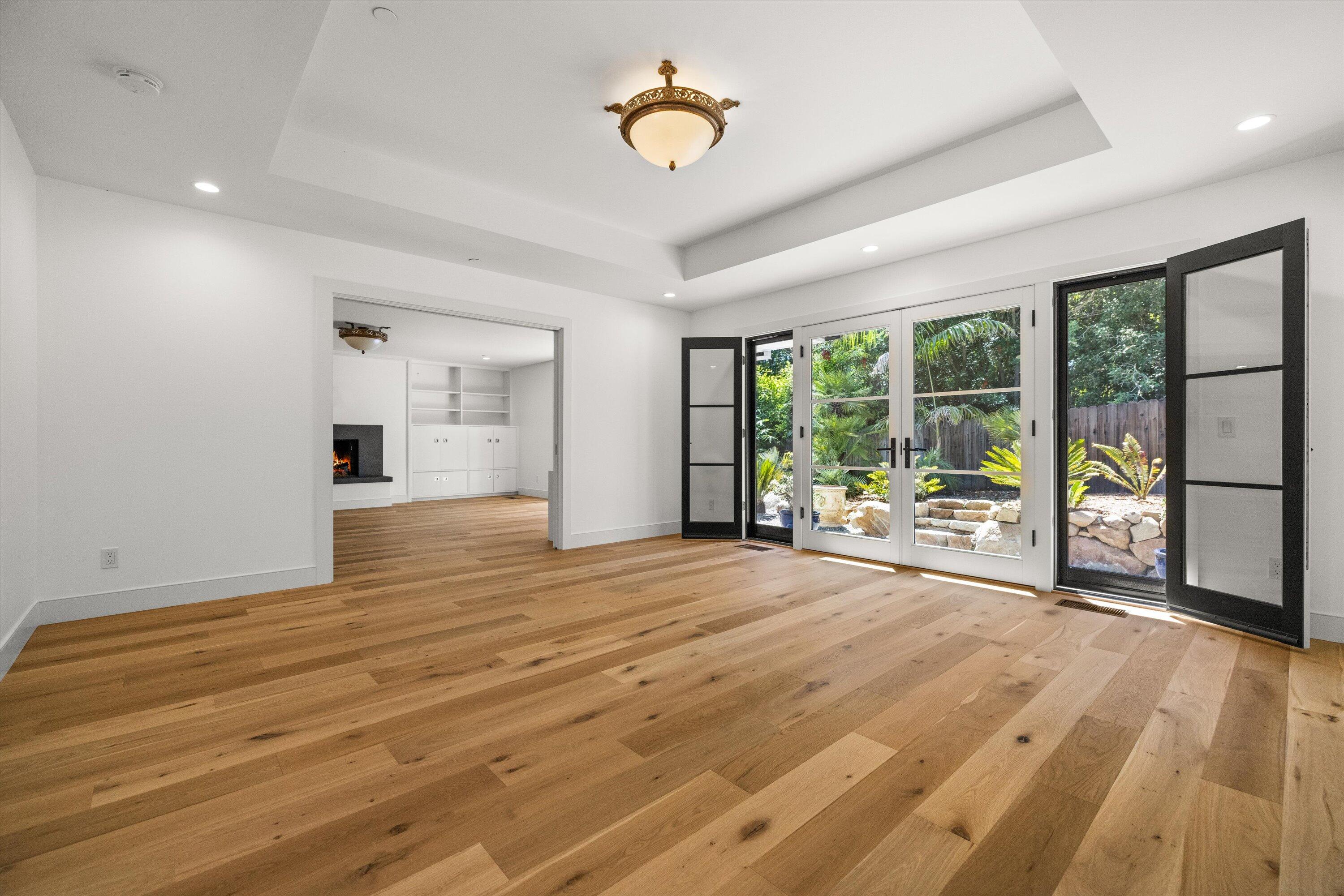 0 East Valley Road Montecito, CA 93108 - Photo 9 of 28 a view of an empty room with wooden floor and a window