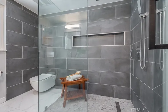 a bathroom with a toilet and a sink