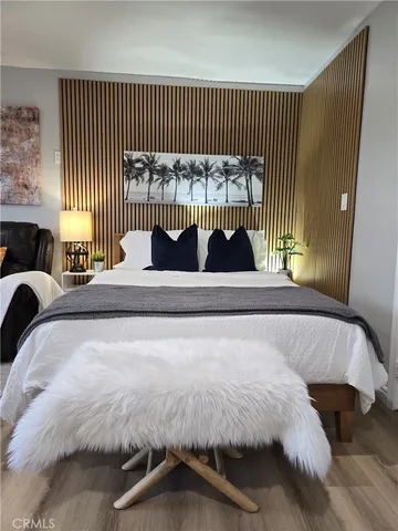 a bathroom with a granite countertop sink mirror and bathtub