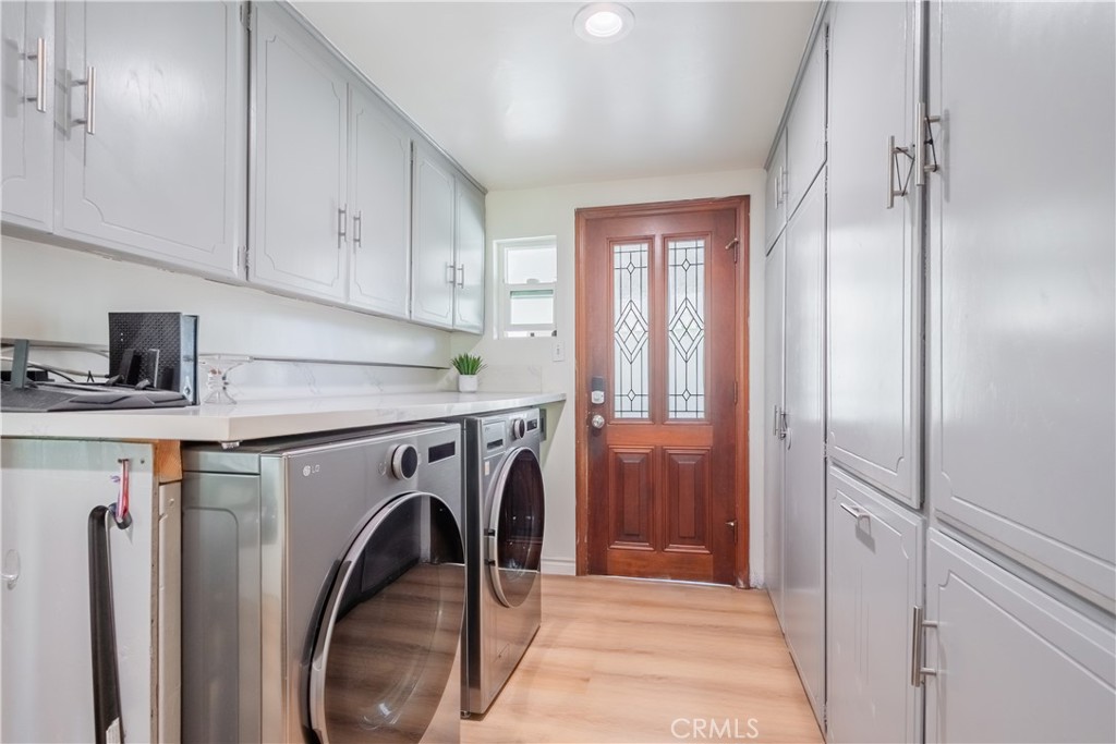 19742 Cameron Avenue Covina, CA 91724 - Photo 42 of 48 a utility room with dryer and washer