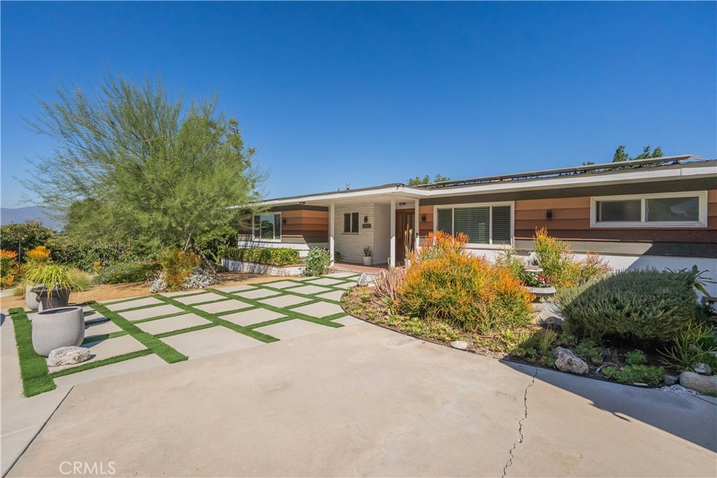 19742 Cameron Avenue Covina, CA 91724 - Photo 43 of 48 front view of a house with a yard