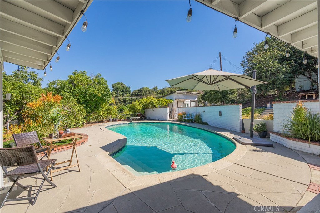19742 Cameron Avenue Covina, CA 91724 - Photo 48 of 48 a view of a swimming pool with a patio