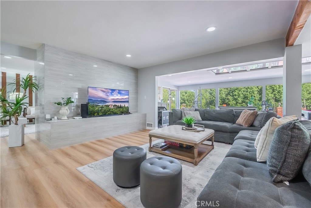 19742 Cameron Avenue Covina, CA 91724 - Photo 8 of 48 a living room with furniture and a large window