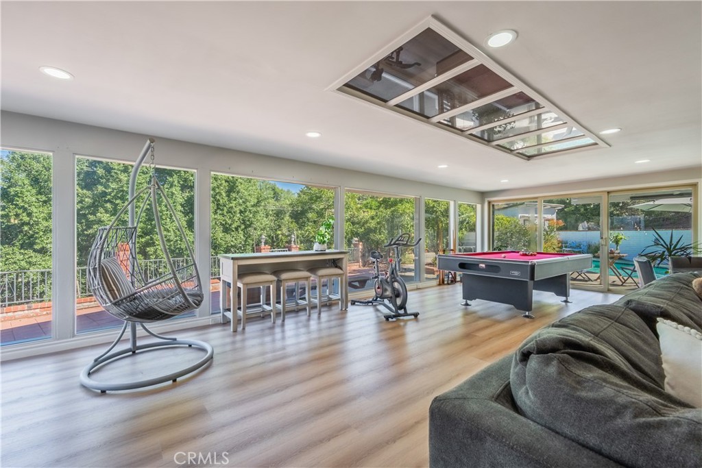 19742 Cameron Avenue Covina, CA 91724 - Photo 9 of 48 a living room with furniture and a large window