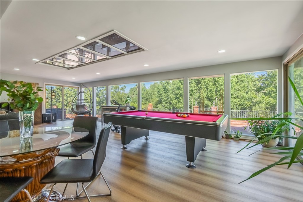 19742 Cameron Avenue Covina, CA 91724 - Photo 10 of 48 a room with lots of furniture and wooden floor