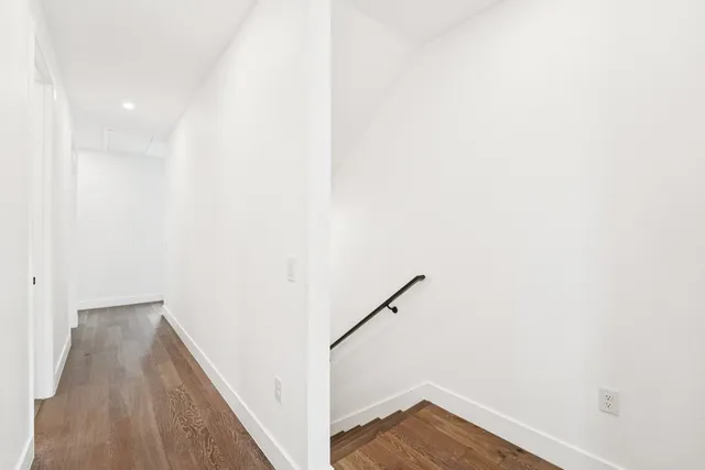 a view of hallway with stairs