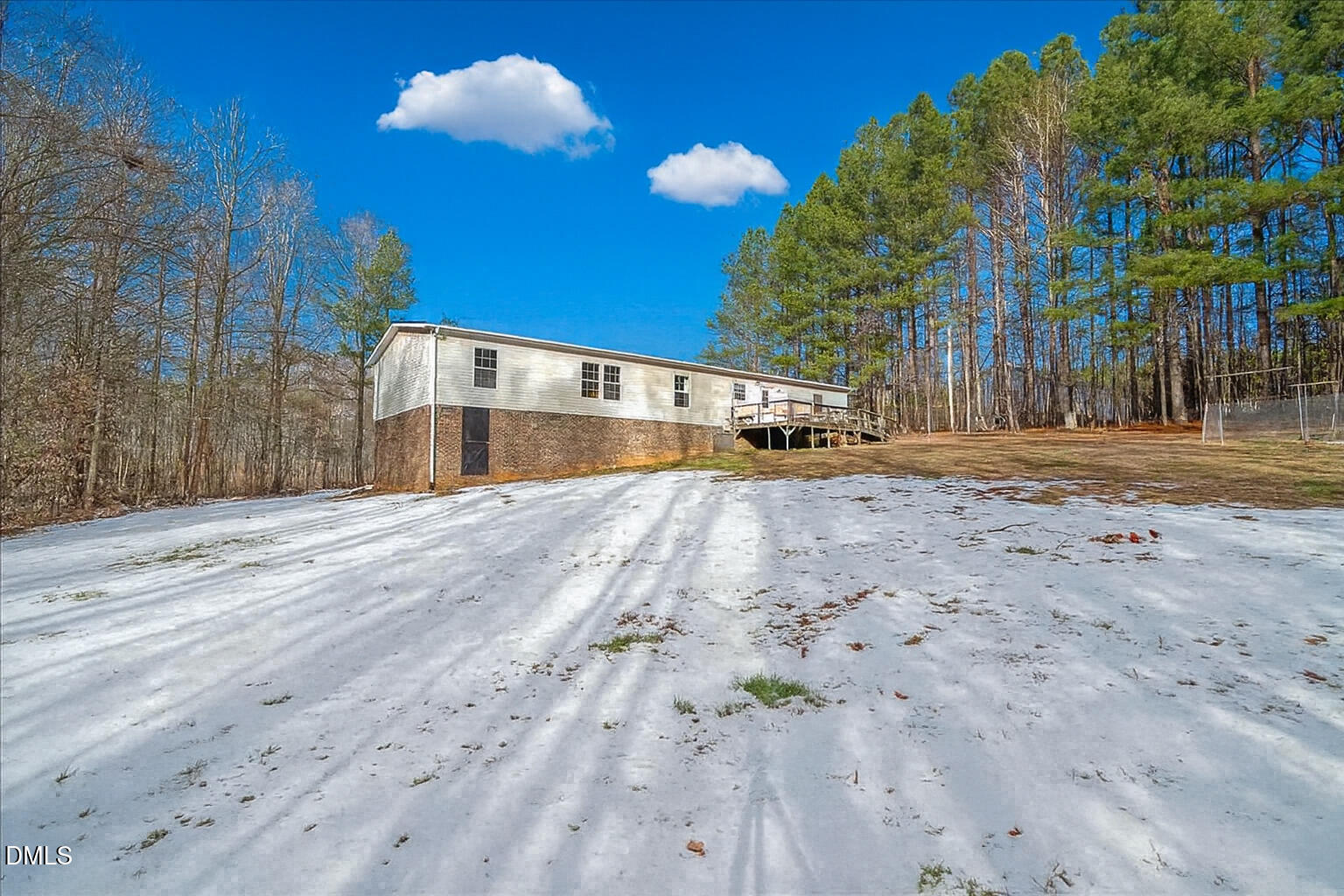 200 Griesch Road Roxboro, NC 27574 - Photo 19 of 22 Rear View w/ Deck & Brick Foundation