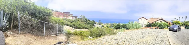 a view of a garden with a bench