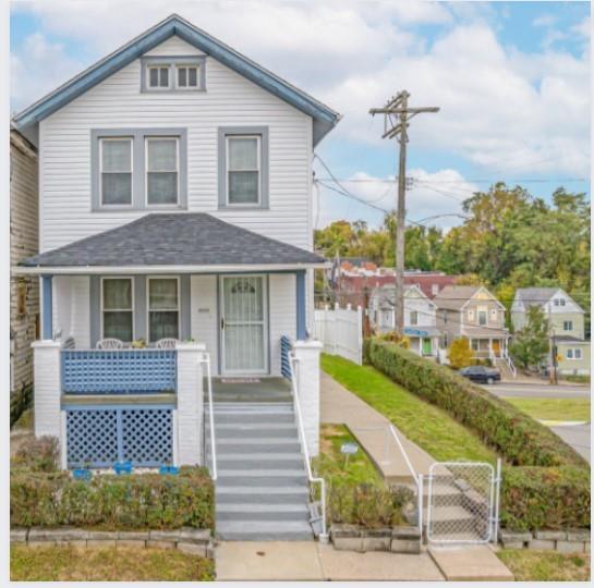 2539 Mahon Street Pittsburgh, PA 15219 - Photo 1 of 24 a front view of a house with a garden