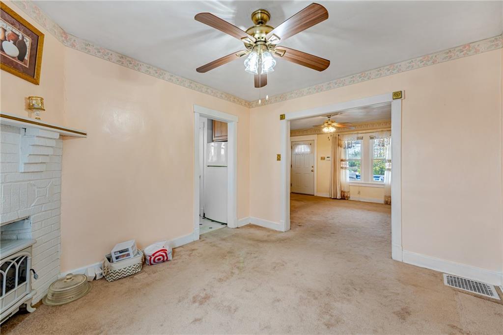 2539 Mahon Street Pittsburgh, PA 15219 - Photo 13 of 24 a view of a livingroom with a chandelier fan