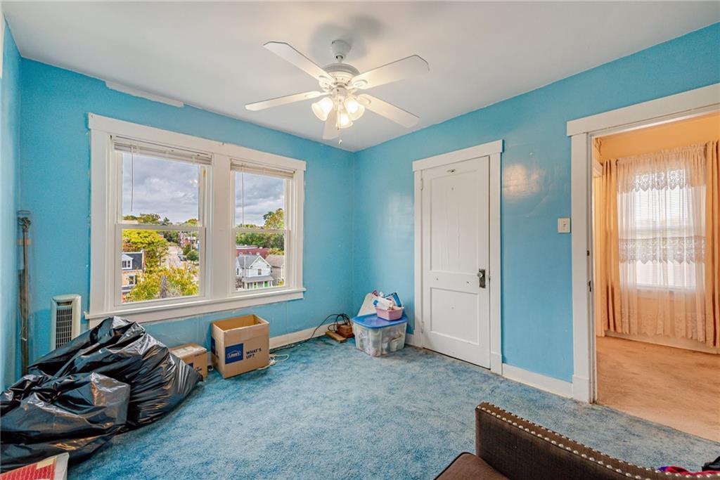 2539 Mahon Street Pittsburgh, PA 15219 - Photo 21 of 24 a living room with furniture and a window