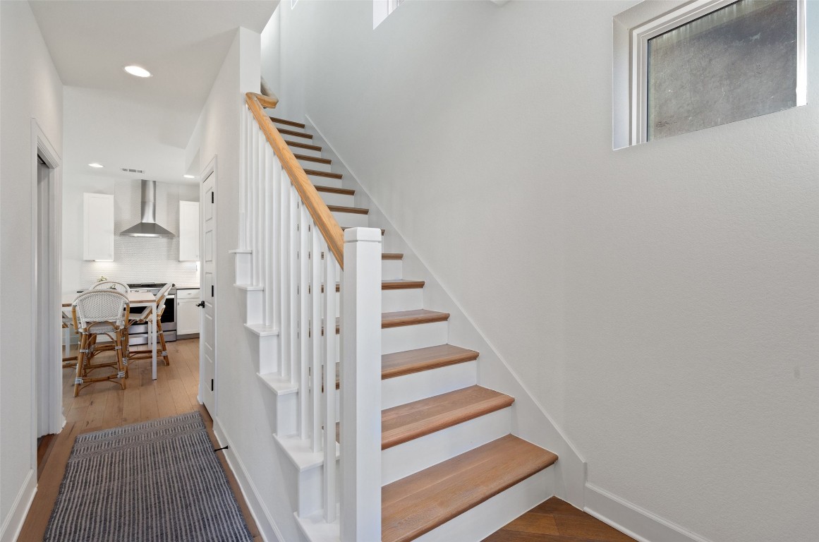 209 Ben Howell Drive, Unit B Austin, TX 78704 - Photo 18 of 39 a view of entryway and hall with wooden floor