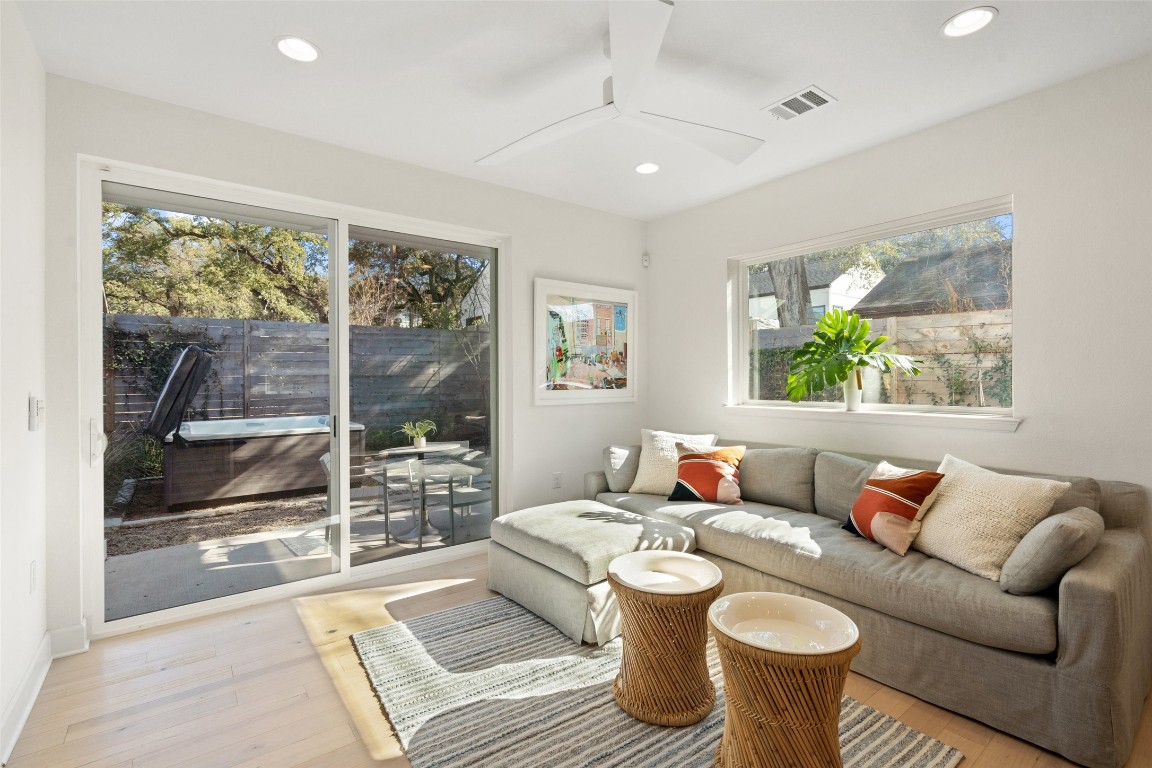 209 Ben Howell Drive, Unit B Austin, TX 78704 - Photo 2 of 39 a living room with furniture and a window