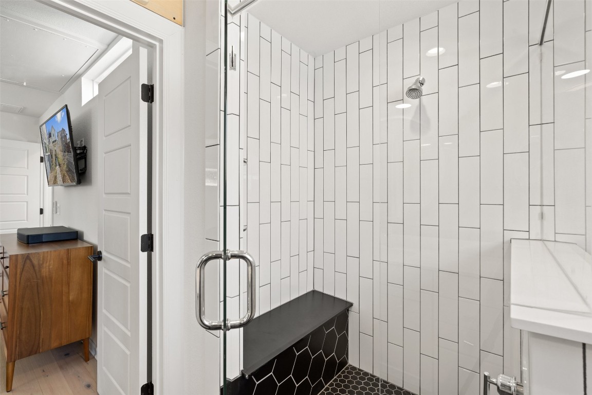 209 Ben Howell Drive, Unit B Austin, TX 78704 - Photo 25 of 39 a bathroom with a shower