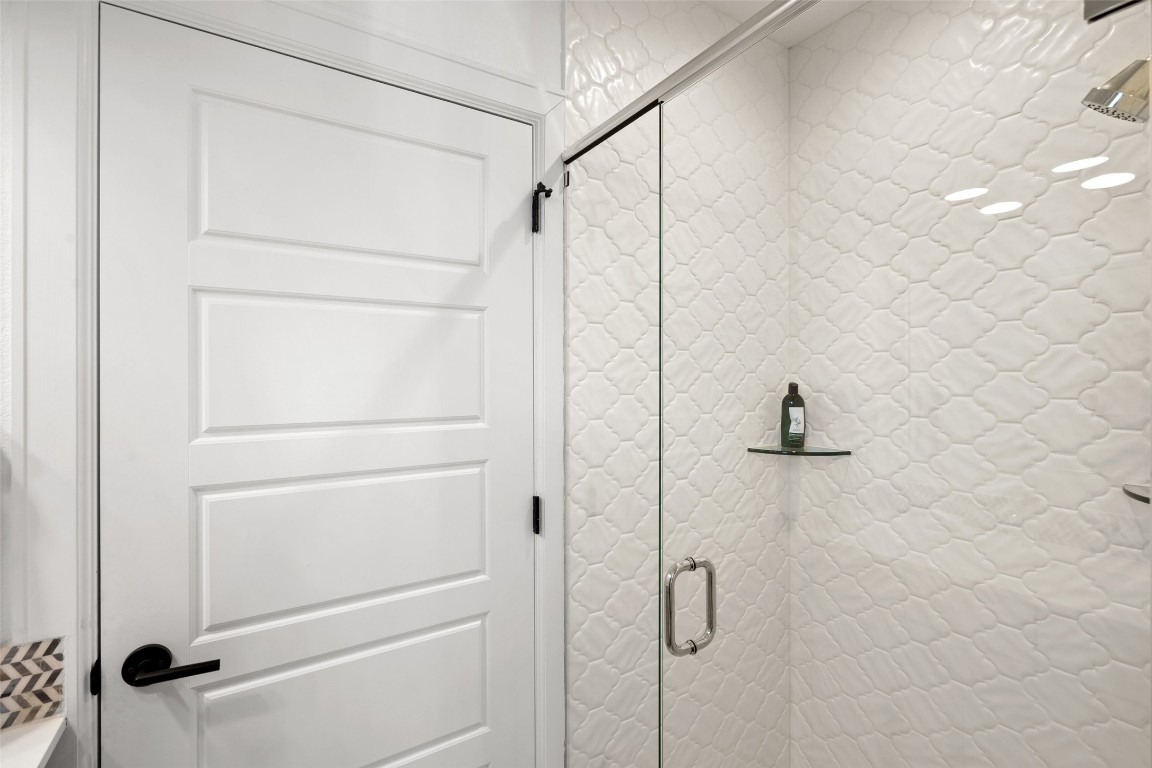 209 Ben Howell Drive, Unit B Austin, TX 78704 - Photo 32 of 39 a bathroom with a shower