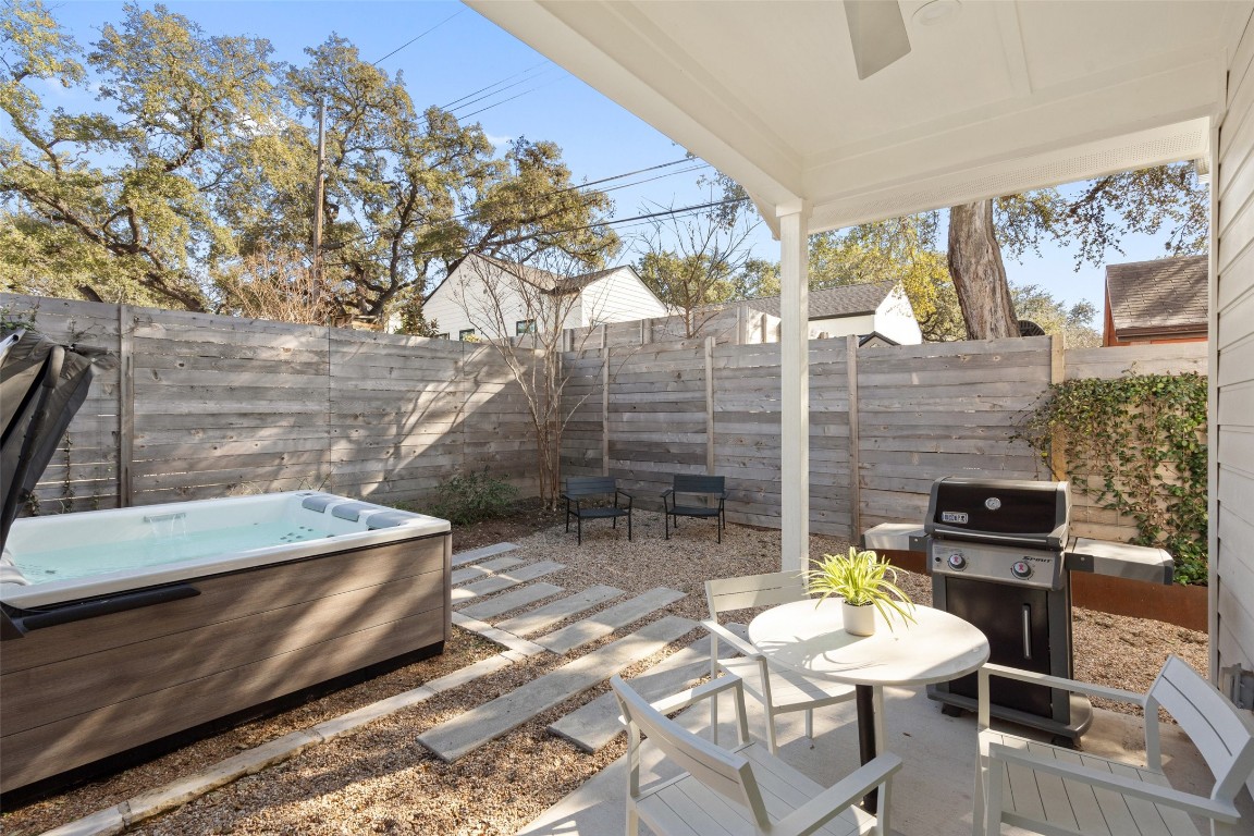 209 Ben Howell Drive, Unit B Austin, TX 78704 - Photo 35 of 39 a balcony with chairs and table