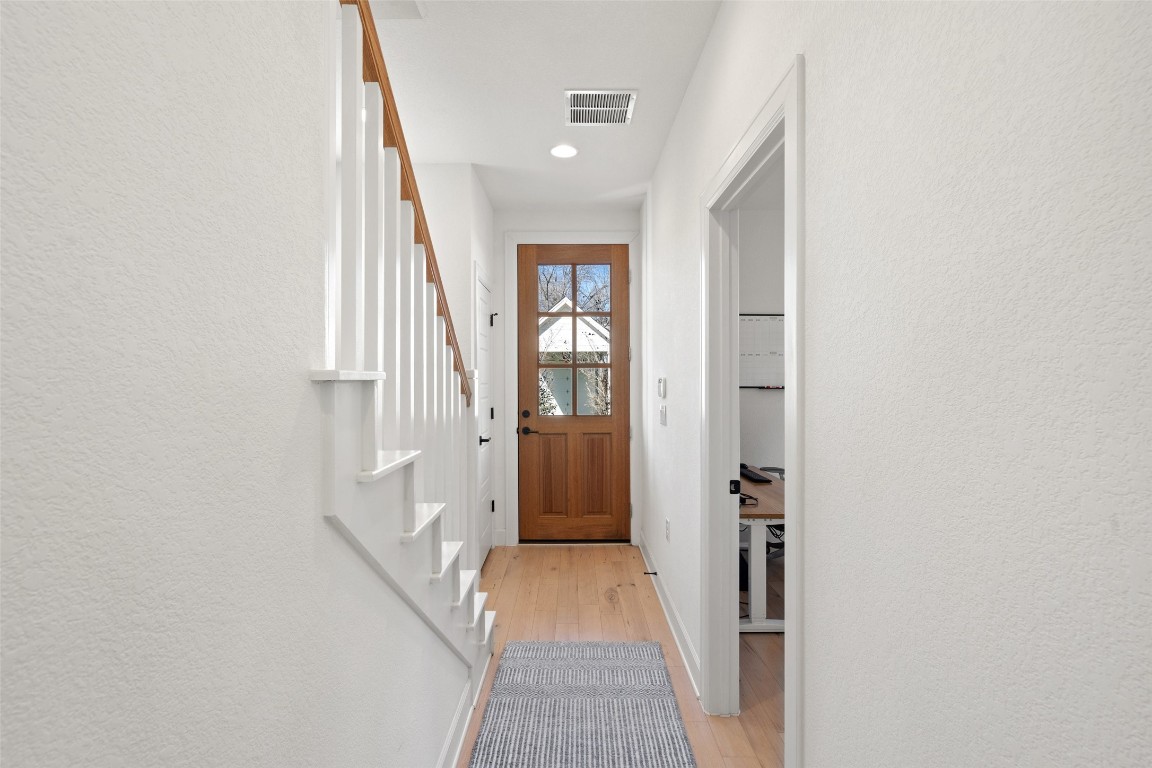 209 Ben Howell Drive, Unit B Austin, TX 78704 - Photo 5 of 39 a view of a hallway with a white walls
