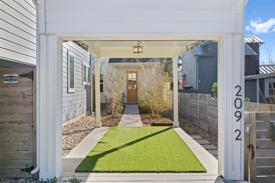 209 Ben Howell Drive, Unit B Austin, TX 78704 - Photo 7 of 39 a bathroom with a mirror and a shower