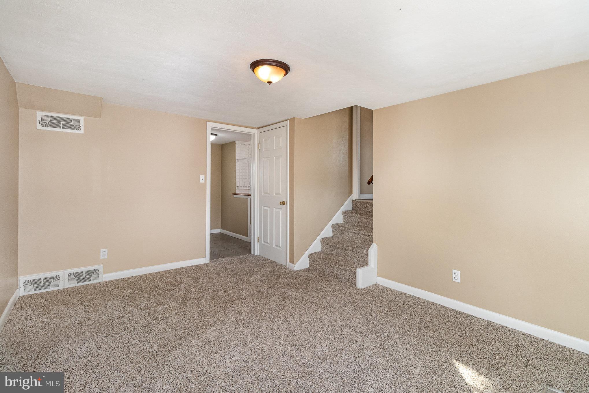 2540 Raleigh Drive York, PA 17402 - Photo 11 of 37 Main level family room with storage closet
