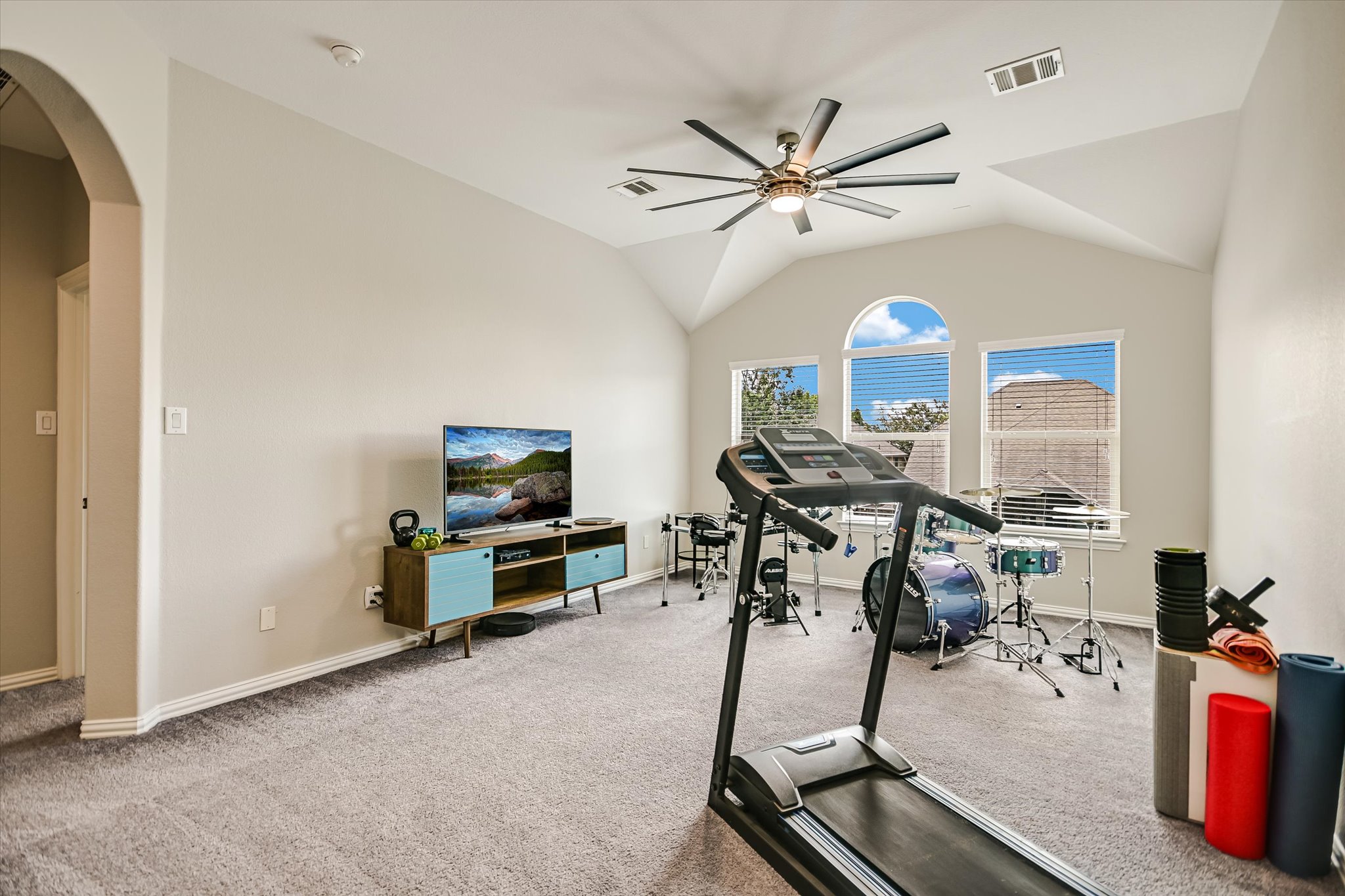 4623 Chestnut Meadows Bend Georgetown, TX 78626 - Photo 17 of 30 a view of a livingroom with furniture and a flat screen tv