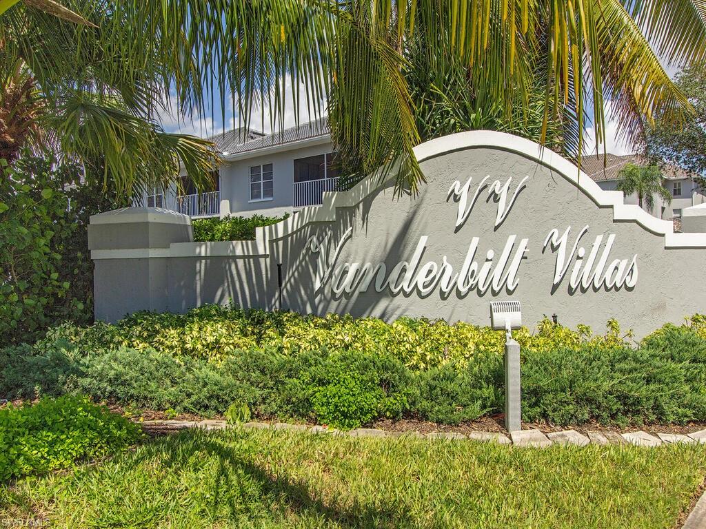 519 Roma Court, Unit 3201 Naples, FL 34110 - Photo 14 of 17 a sign that is on the side of a building