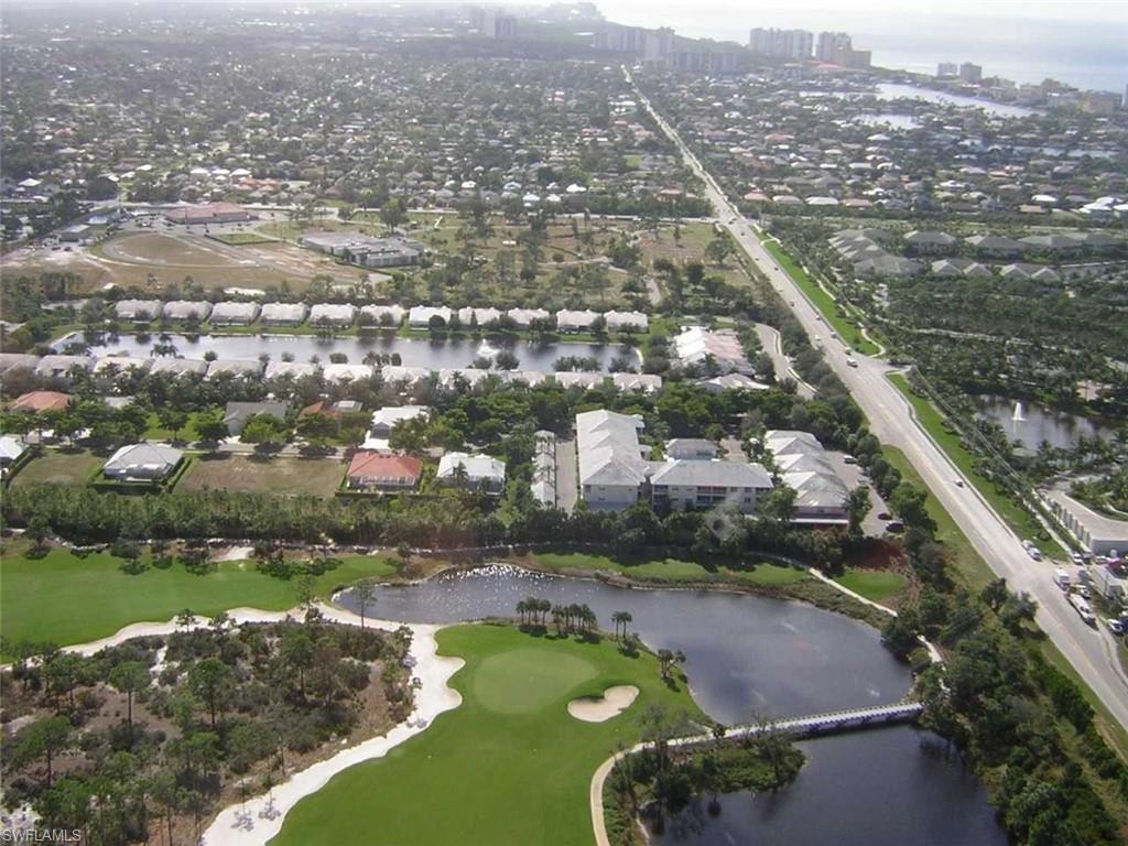 519 Roma Court, Unit 3201 Naples, FL 34110 - Photo 17 of 17 an aerial view of residential houses with outdoor space