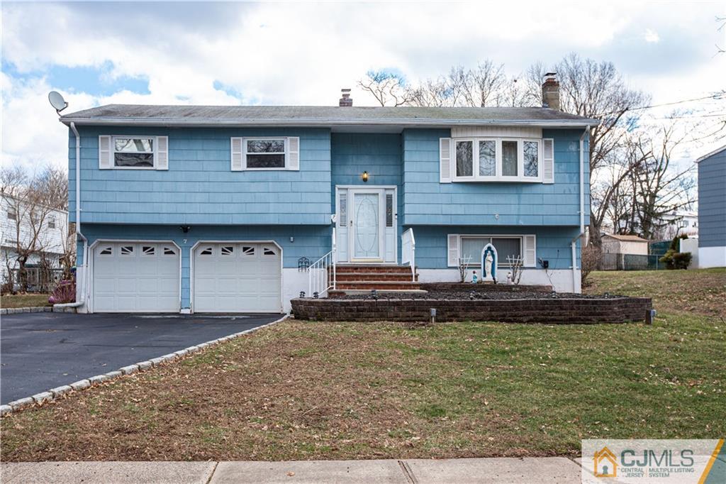 7 Fulton Road Somerset, NJ 08873 - Photo 1 of 24 a front view of a house with a yard