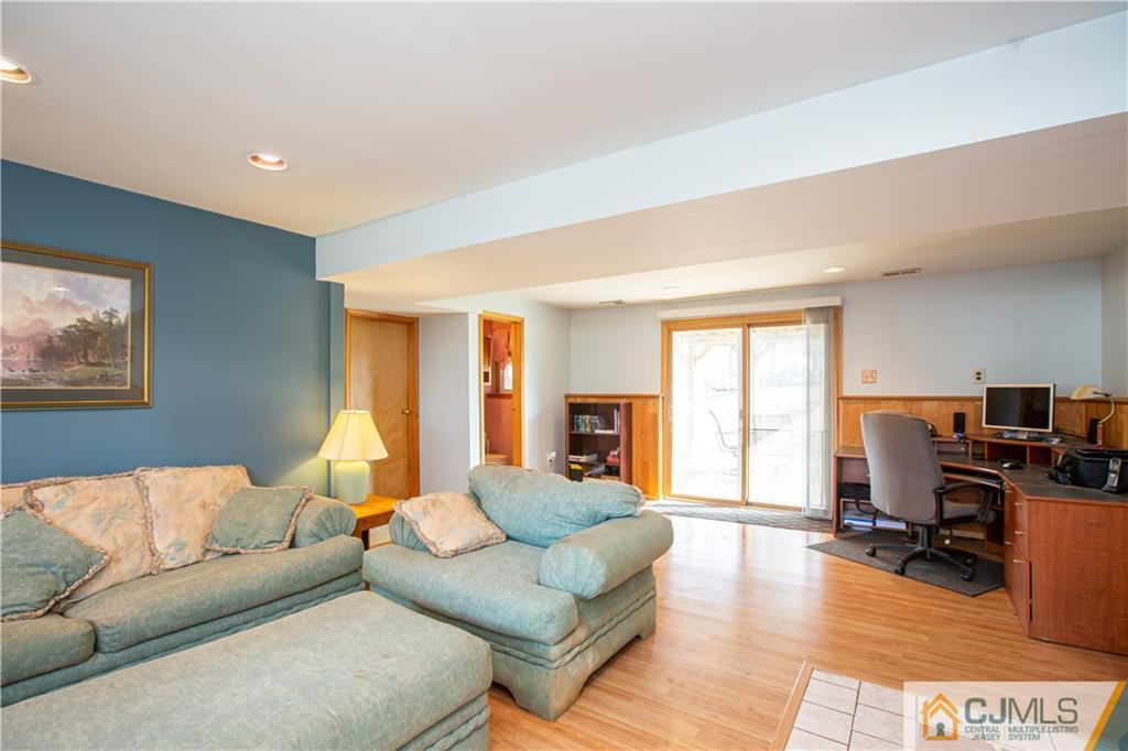 7 Fulton Road Somerset, NJ 08873 - Photo 19 of 24 a living room with furniture window and a flat screen tv