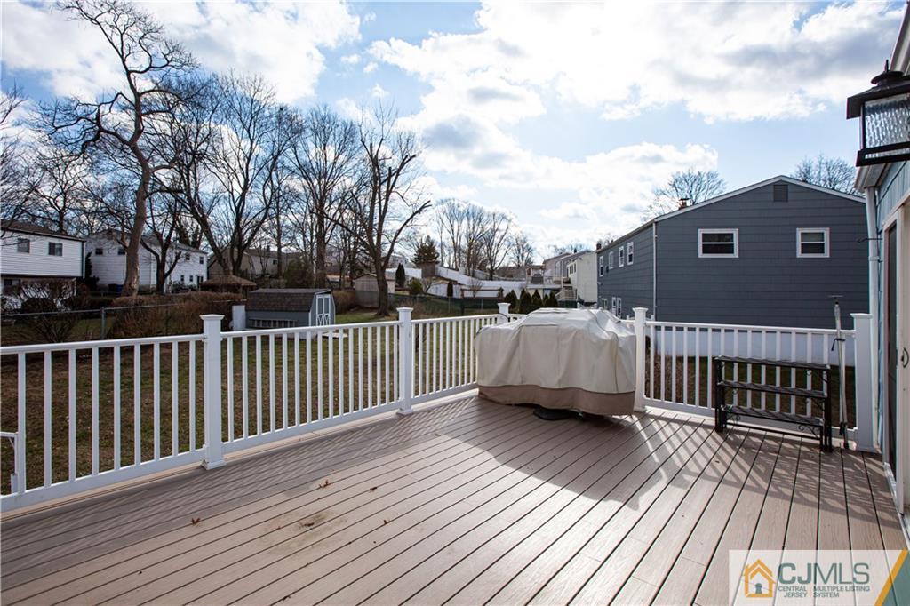 7 Fulton Road Somerset, NJ 08873 - Photo 21 of 24 a view of a wooden roof deck