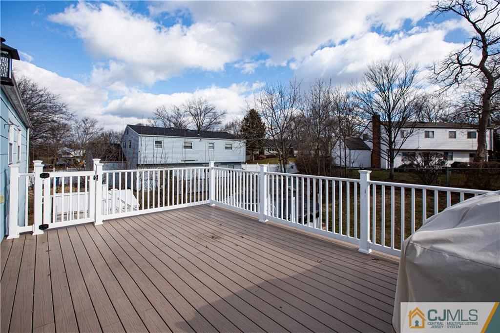 7 Fulton Road Somerset, NJ 08873 - Photo 22 of 24 a view of a wooden roof with wooden floor and fence