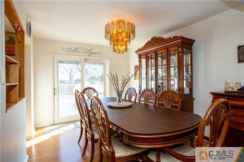 7 Fulton Road Somerset, NJ 08873 - Photo 5 of 24 a view of a dining room with furniture window and wooden floor