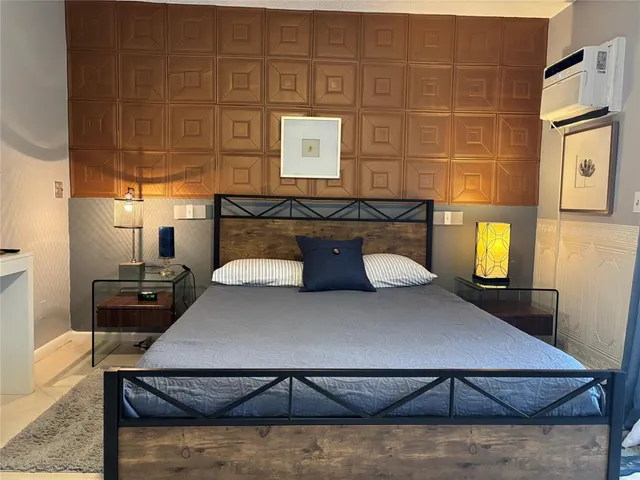 a view of a living room and bathroom