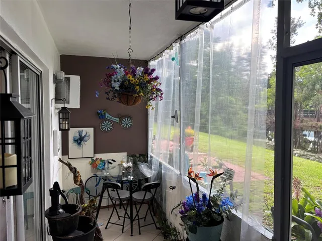 a view of a park with large trees