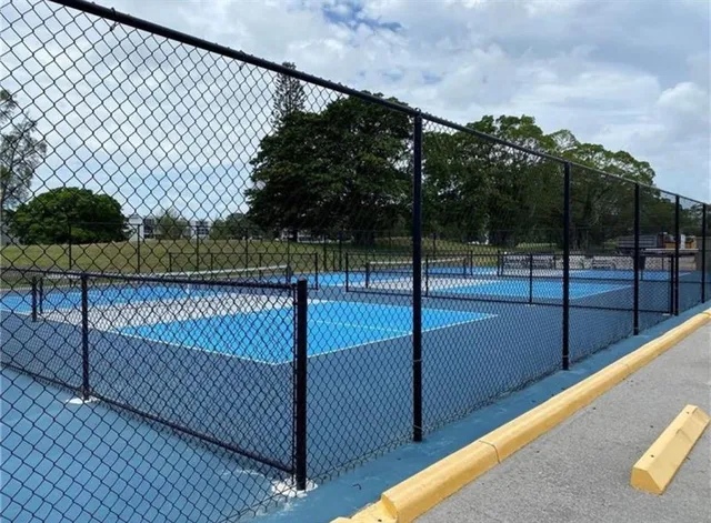 a view of a lake with outdoor seating
