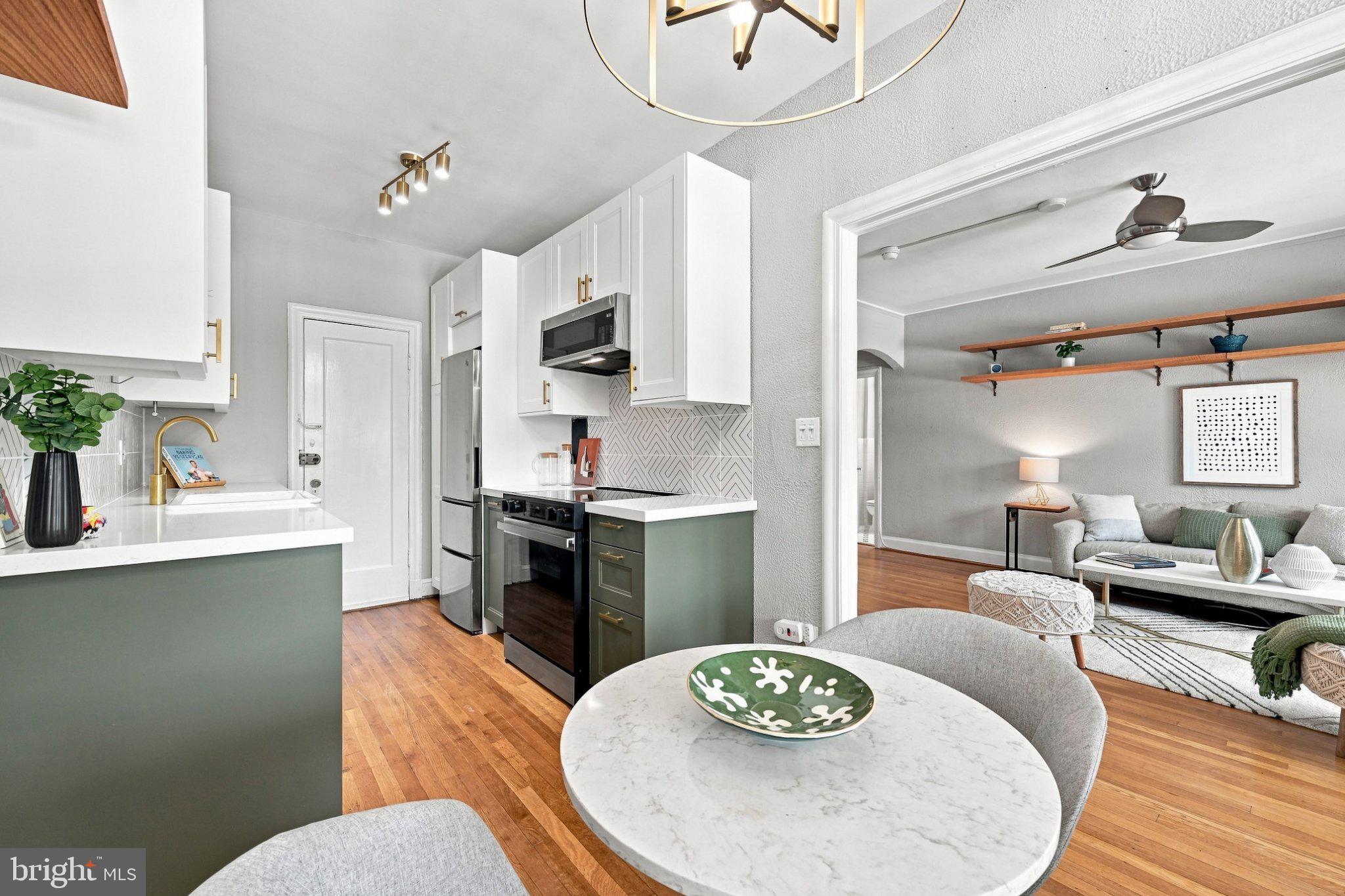 2032 Belmont Road Northwest, Unit 632 Washington, DC 20009 - Photo 15 of 31 Chic kitchen with modern flair.