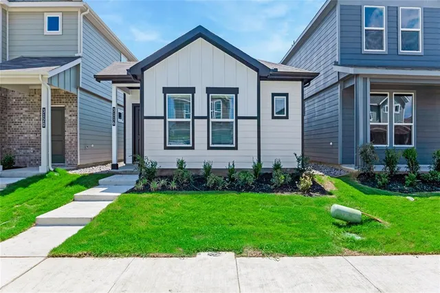 front view of a house and a yard