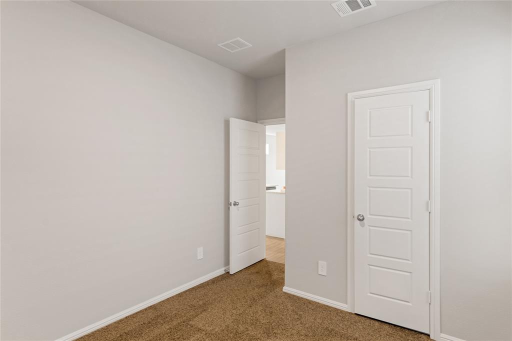 3116 Pecan Farm Lane Fort Worth, TX 76140 - Photo 18 of 25 an empty room with closet area