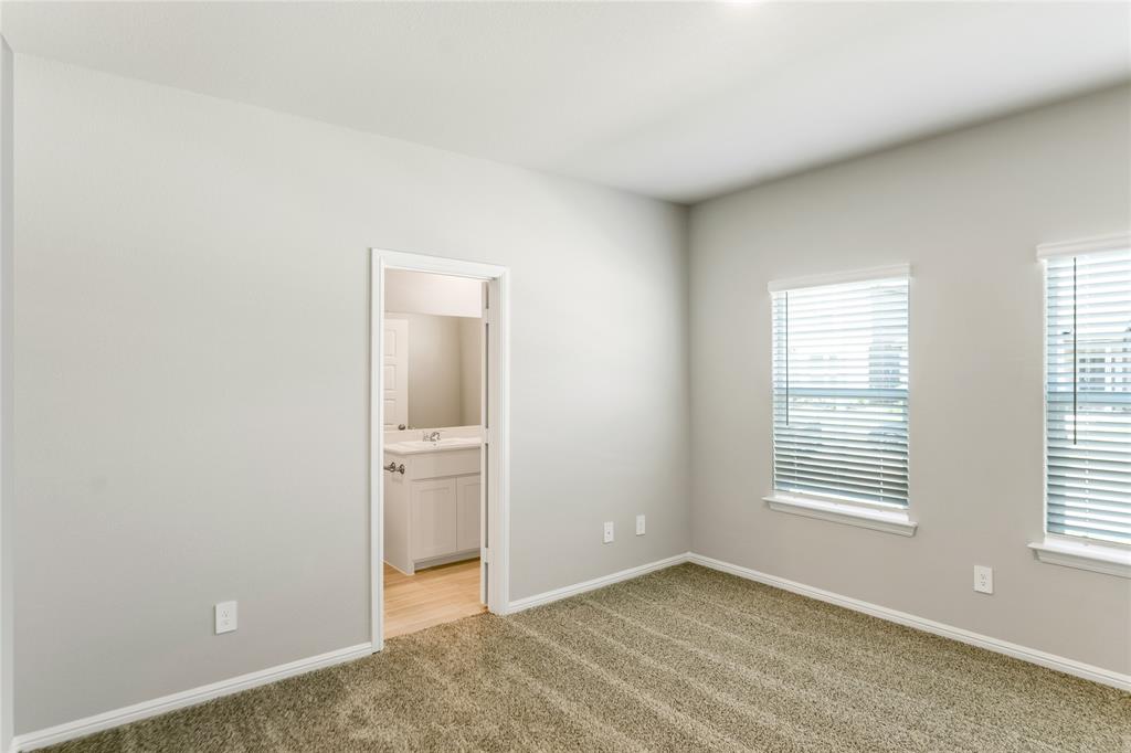 3116 Pecan Farm Lane Fort Worth, TX 76140 - Photo 22 of 25 a view of an empty room with window and closet area