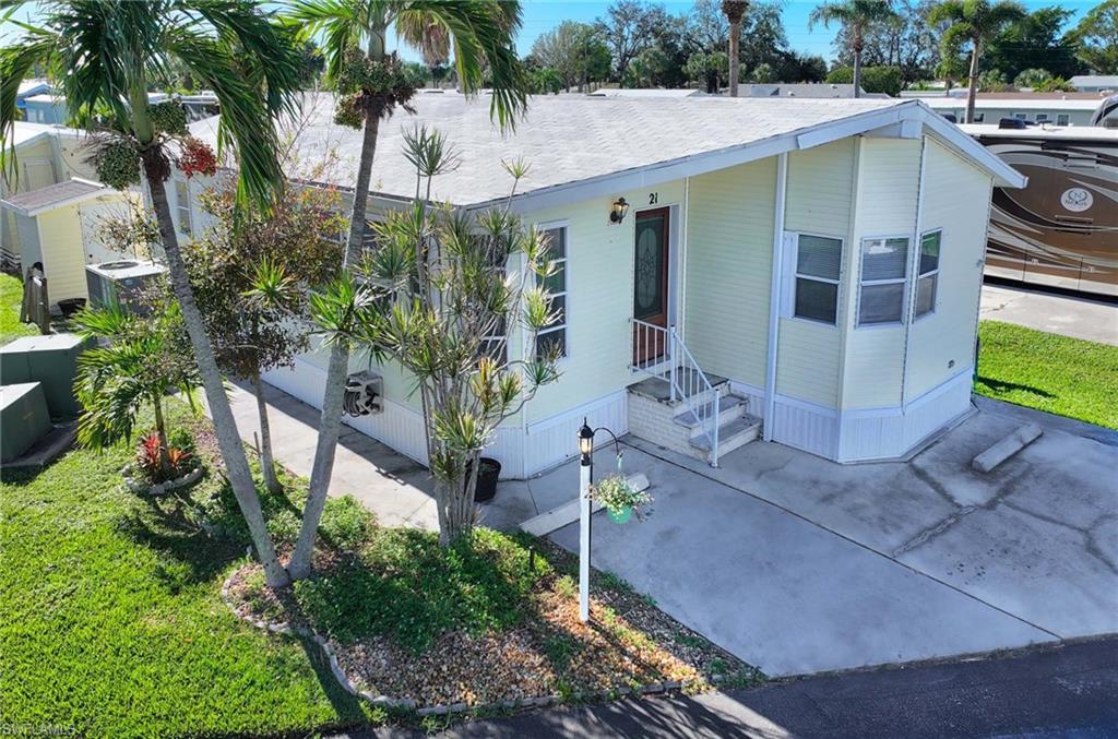 21 Onyx Drive, Unit 21O Naples, FL 34114 - Photo 29 of 30 View of front of home with central AC