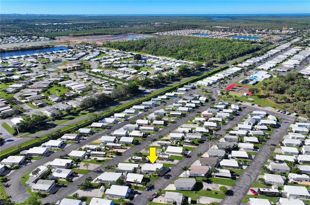 21 Onyx Drive, Unit 21O Naples, FL 34114 - Photo 30 of 30 Bird's eye view with a water view