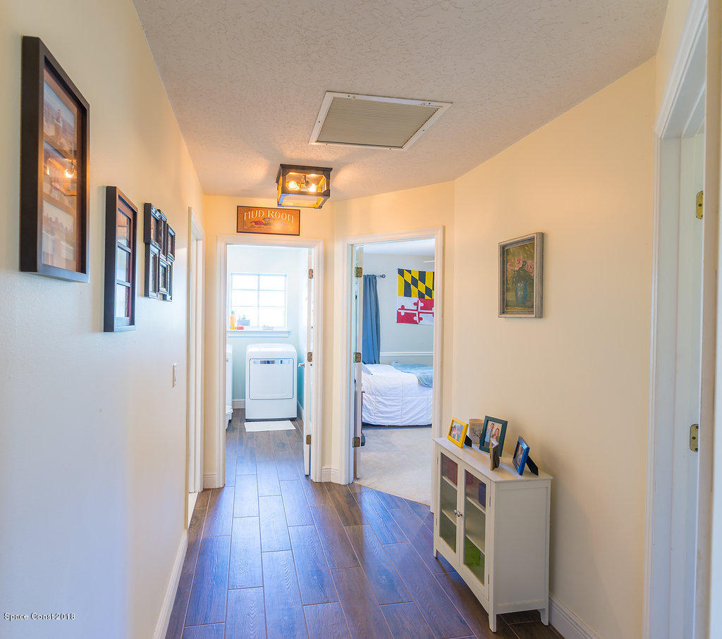 3956 Sparrow Hawk Road Melbourne, FL 32934 - Photo 25 of 34 a room with furniture and a window